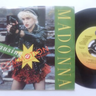 Madonna Causing A Commotion 7" Sire 728224 EX/VG 1987 US pressing in picture sleeve, sleeve has seam split on bottom edge