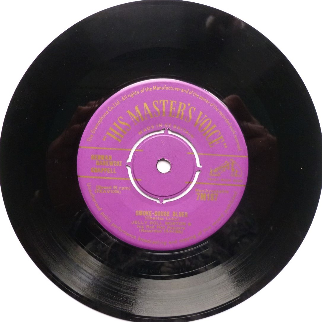 Jelly Roll Morton Smoke-House Blues 7" HMV 7M187 VG 1950s purple label gold print. There is a light short scratch at the very end of side two. It causes three clear ticks at the very end of the track