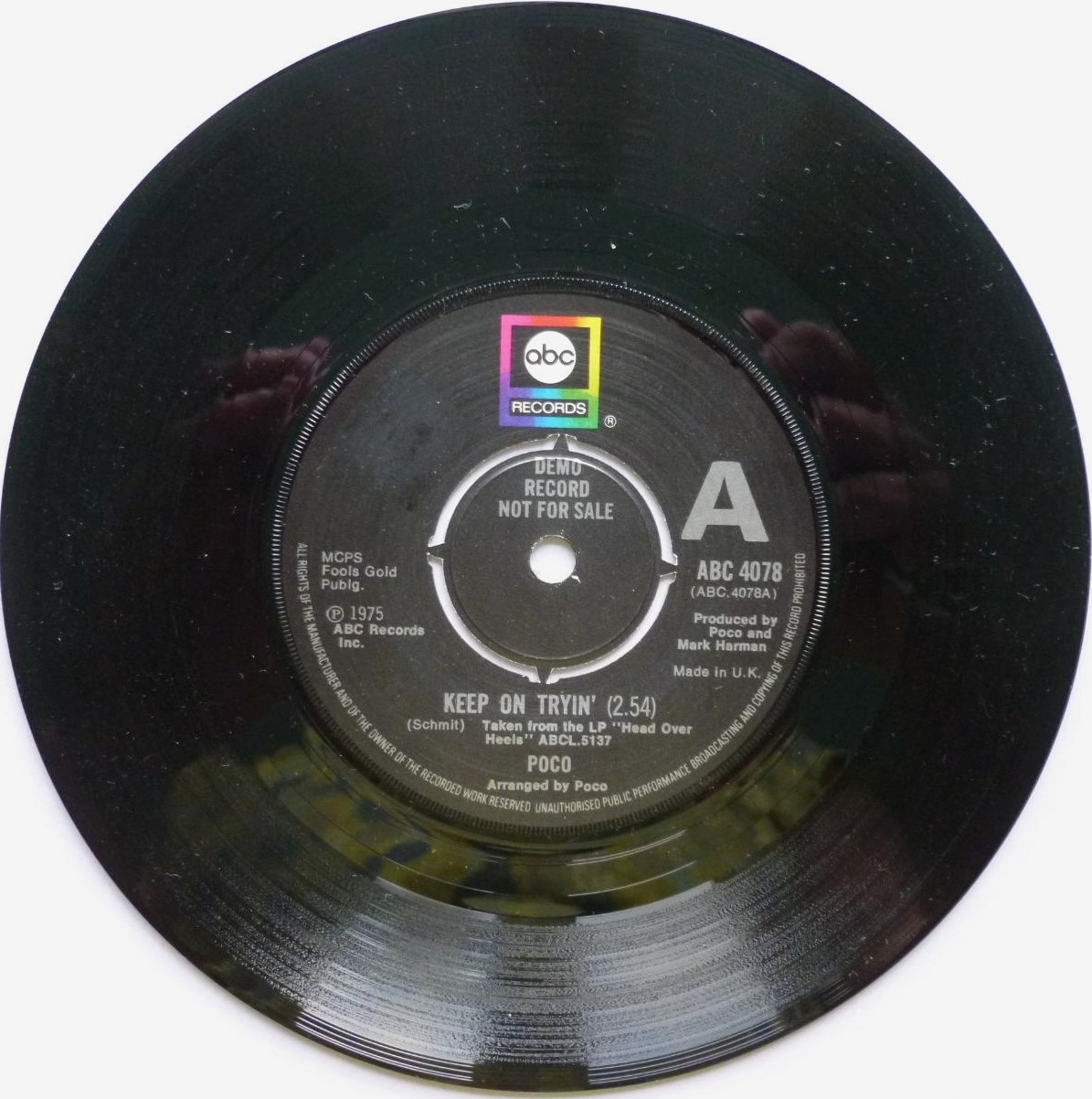 Poco Keep On Tryin 7" ABC ABC4078 VG 1975 record is slightly dished (the record is like a plate - one side curves up slightly at the edge, the other side curves down slightly at the edge)"