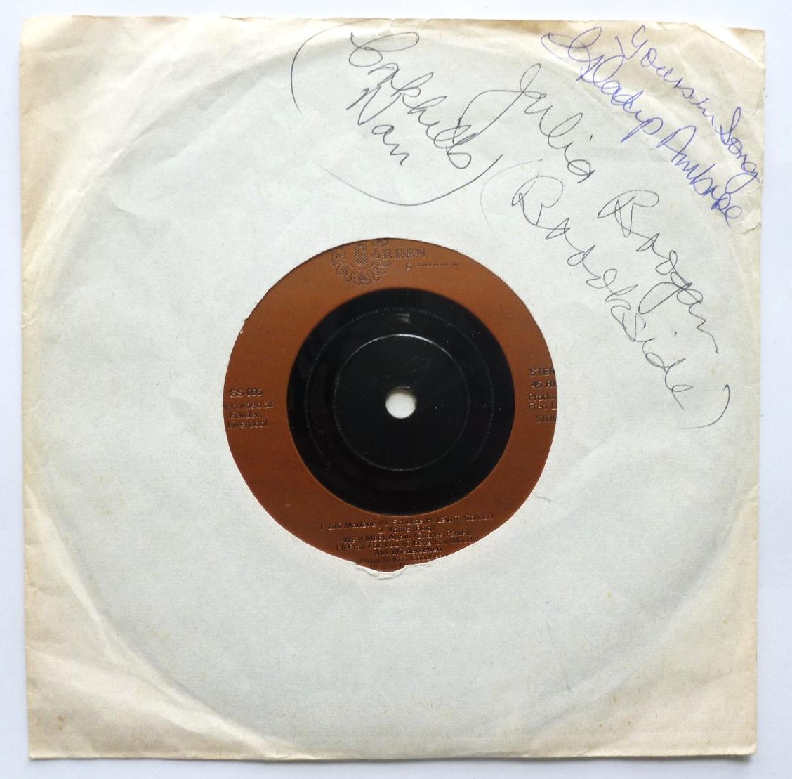 Gladys Ambrose Lilli Marlene 7" Garden GS005 VG 1990s 7-track single, record looks VG. It plays well with odd ticks and there is a one minute audible scratch on side one. White sleeve is quite tatty. It is signed Yours in song Gladys Ambrose Julia Brogan (Brookside)"