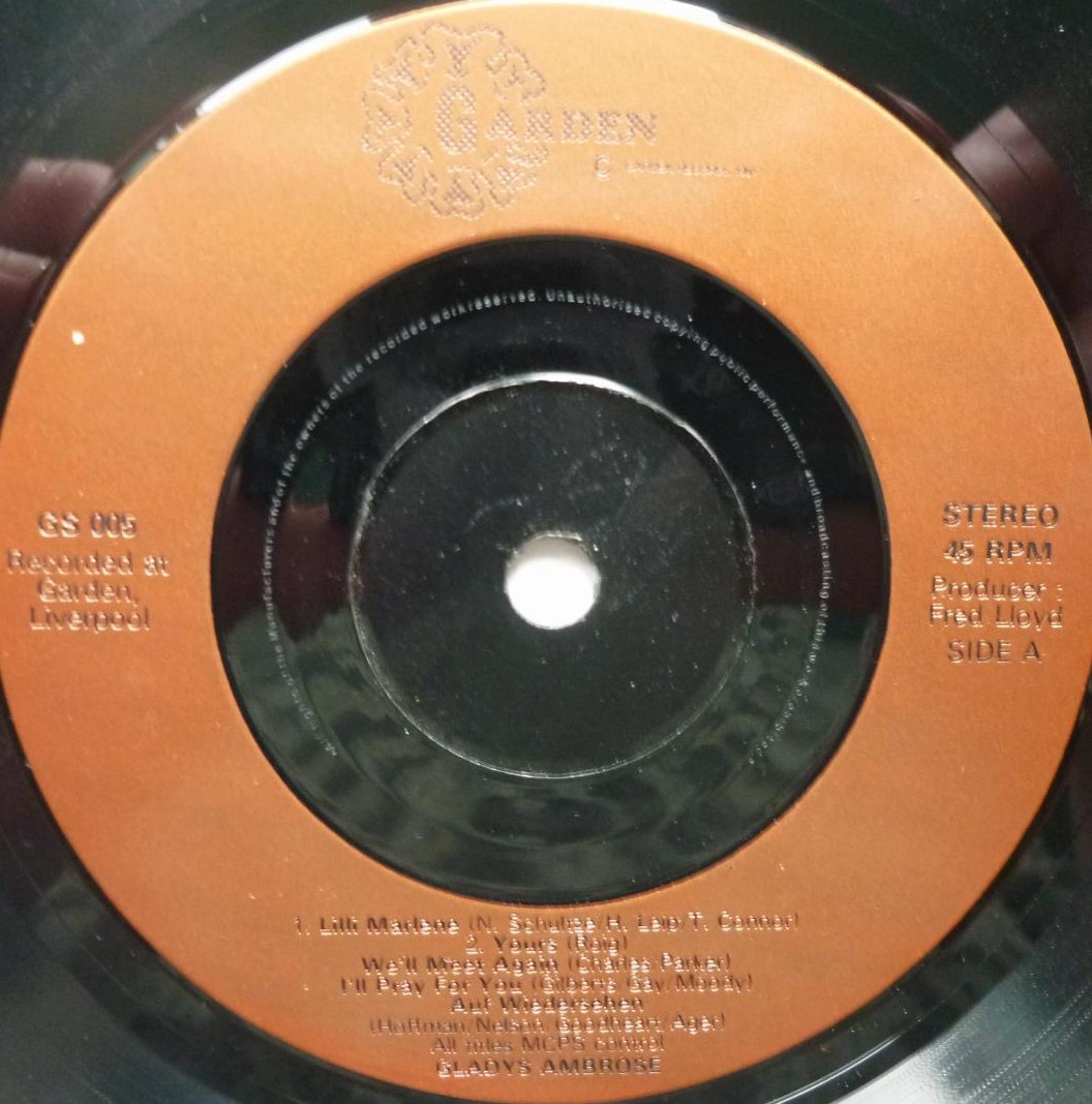 Gladys Ambrose Lilli Marlene 7" Garden GS005 VG 1990s 7-track single, record looks VG. It plays well with odd ticks and there is a one minute audible scratch on side one. White sleeve is quite tatty. It is signed Yours in song Gladys Ambrose Julia Brogan (Brookside)" - Image 3