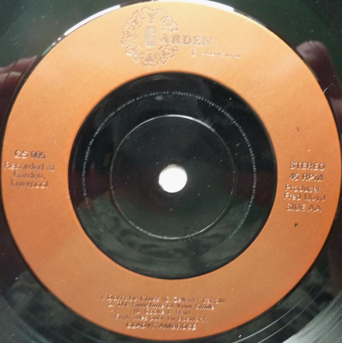 Gladys Ambrose Lilli Marlene 7" Garden GS005 VG 1990s 7-track single, record looks VG. It plays well with odd ticks and there is a one minute audible scratch on side one. White sleeve is quite tatty. It is signed Yours in song Gladys Ambrose Julia Brogan (Brookside)" - Image 4