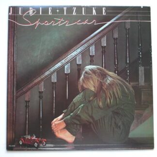 Judie Tzuke Sports Car LP Rocket PIG3249 EX/EX 1980 US pressing, with inner, sleeve is cut at top edge (to mark it for export)."