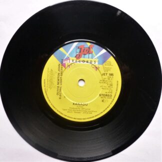 Olivia Newton John Xanadu 7" Jet JET185 EX 1980 a-side with ELO, The die-cut picture sleeve is made from thin paper and is quite creased but it is VG."