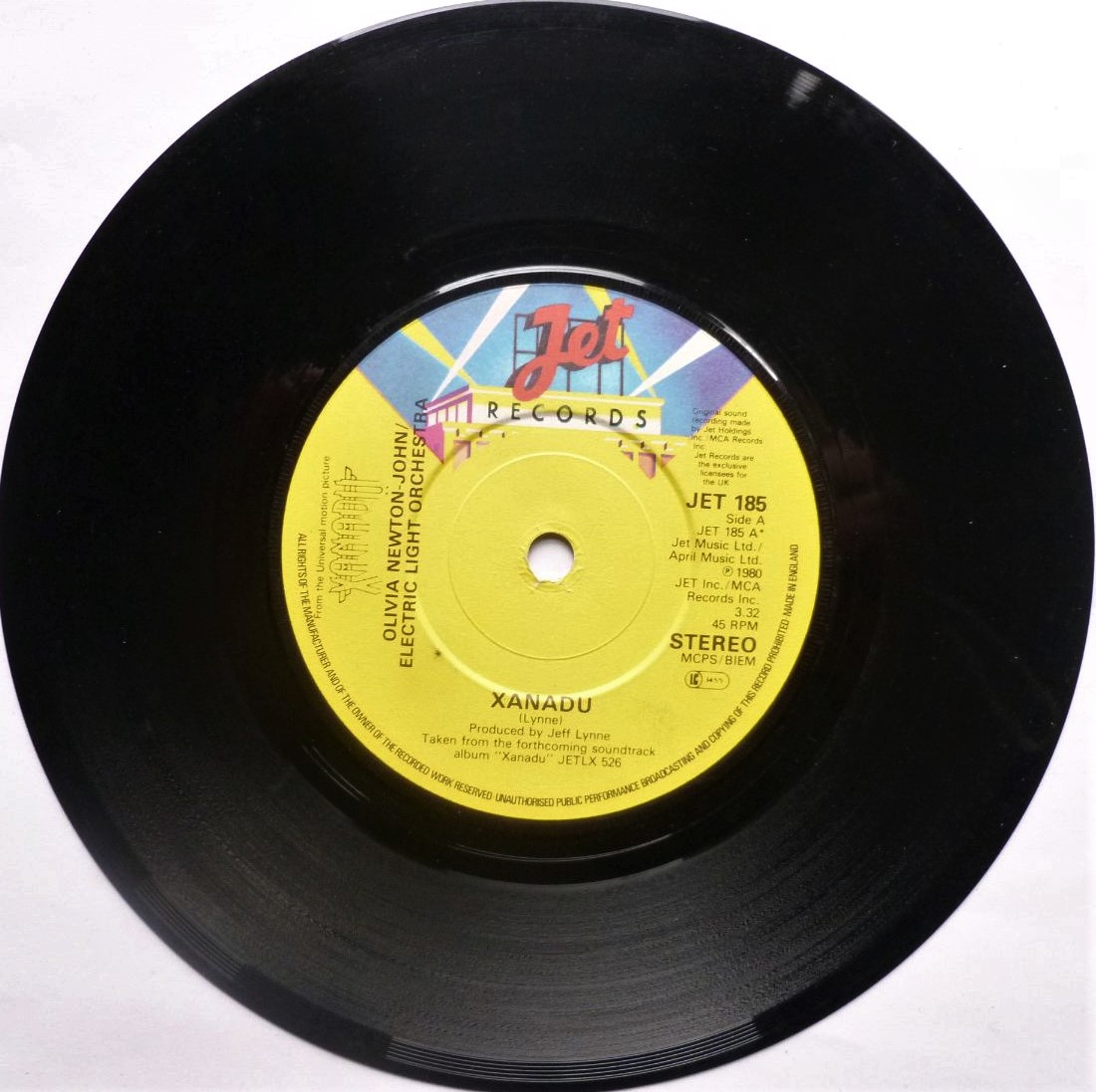 Olivia Newton John Xanadu 7" Jet JET185 EX 1980 a-side with ELO, The die-cut picture sleeve is made from thin paper and is quite creased but it is VG."