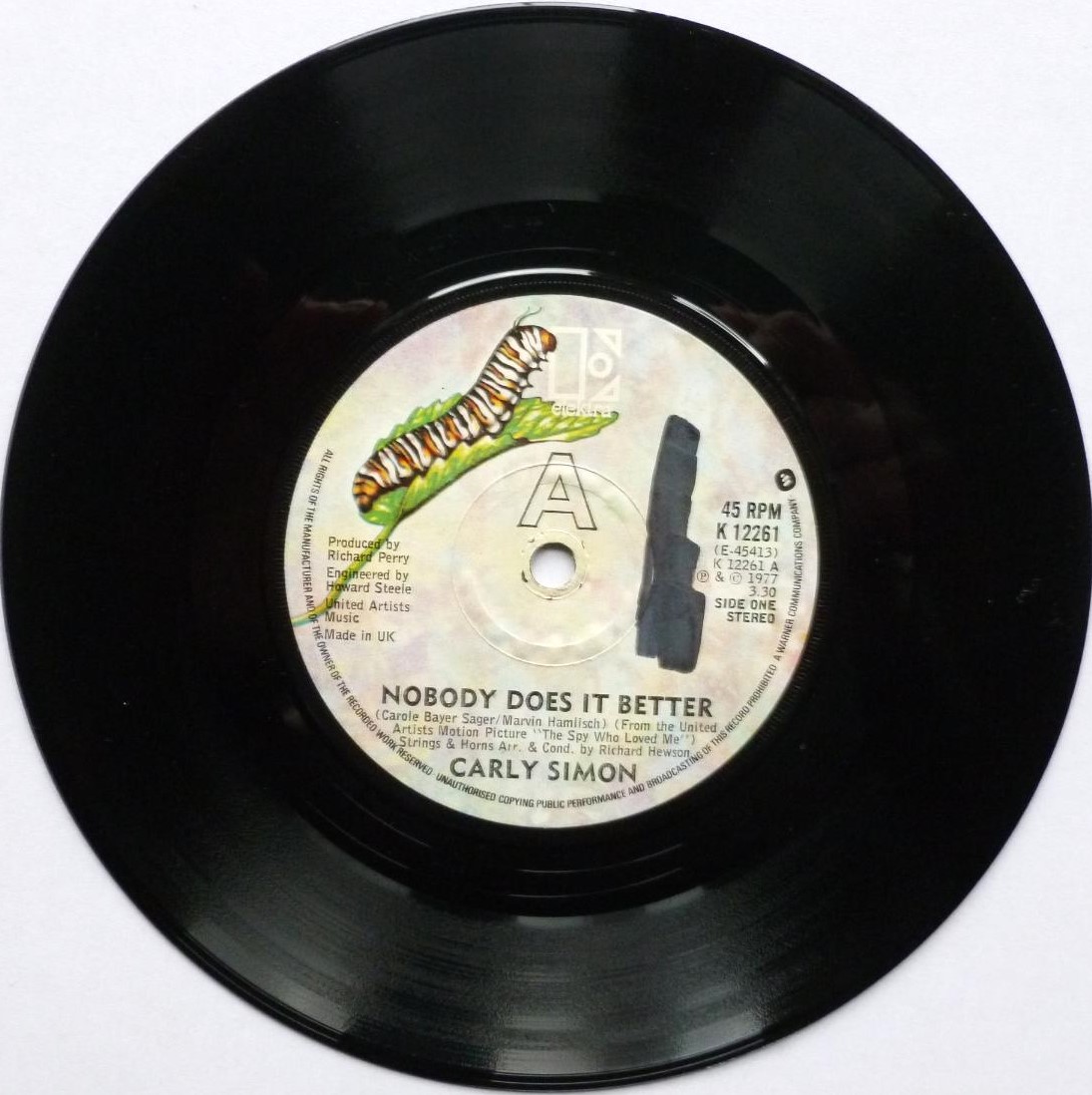 Carly Simon Nobody Does It Better 7" Elektra K12261 EX 1977 there are heavy felt tip marks on both sides of label