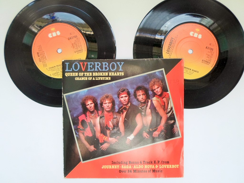 Loverboy Queen Of The Broken Hearts 2x7" CBS DA3705 EX/VG 1983 picture sleeve, double single, second record has 4-tracks and features three other bands - Journey: Chain Reaction, Loverboy: Lucky Ones, Aldo Nove: Fantasy, Saga: On The Loose