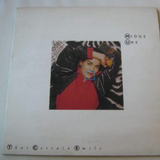 Midge Ure That Certain Smile 7" Chrysalis URE2 EX/EX 1985 gatefold sleeve, clear vinyl