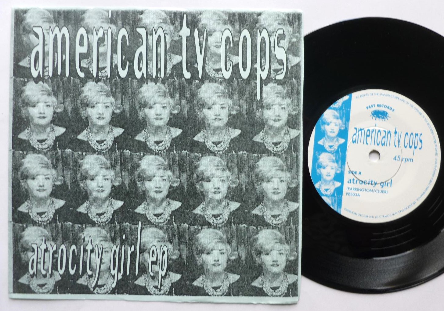 American TV Cops Atrocity Girl 7" Pest PES03 EX/EX 1994 in wraparound picture sleeve
