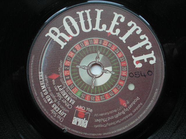 Roulette Lovers And Gamblers 7" Ariola ARO196 EX 1979 there is handwritten number on label and 2mm drill hole in label rim