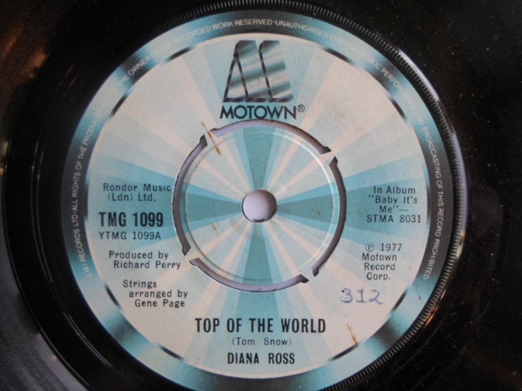 Diana Ross Top Of The World 7" Motown TMG1099 EX 1977 there is writing on the label and a 2mm drill hole in label rim