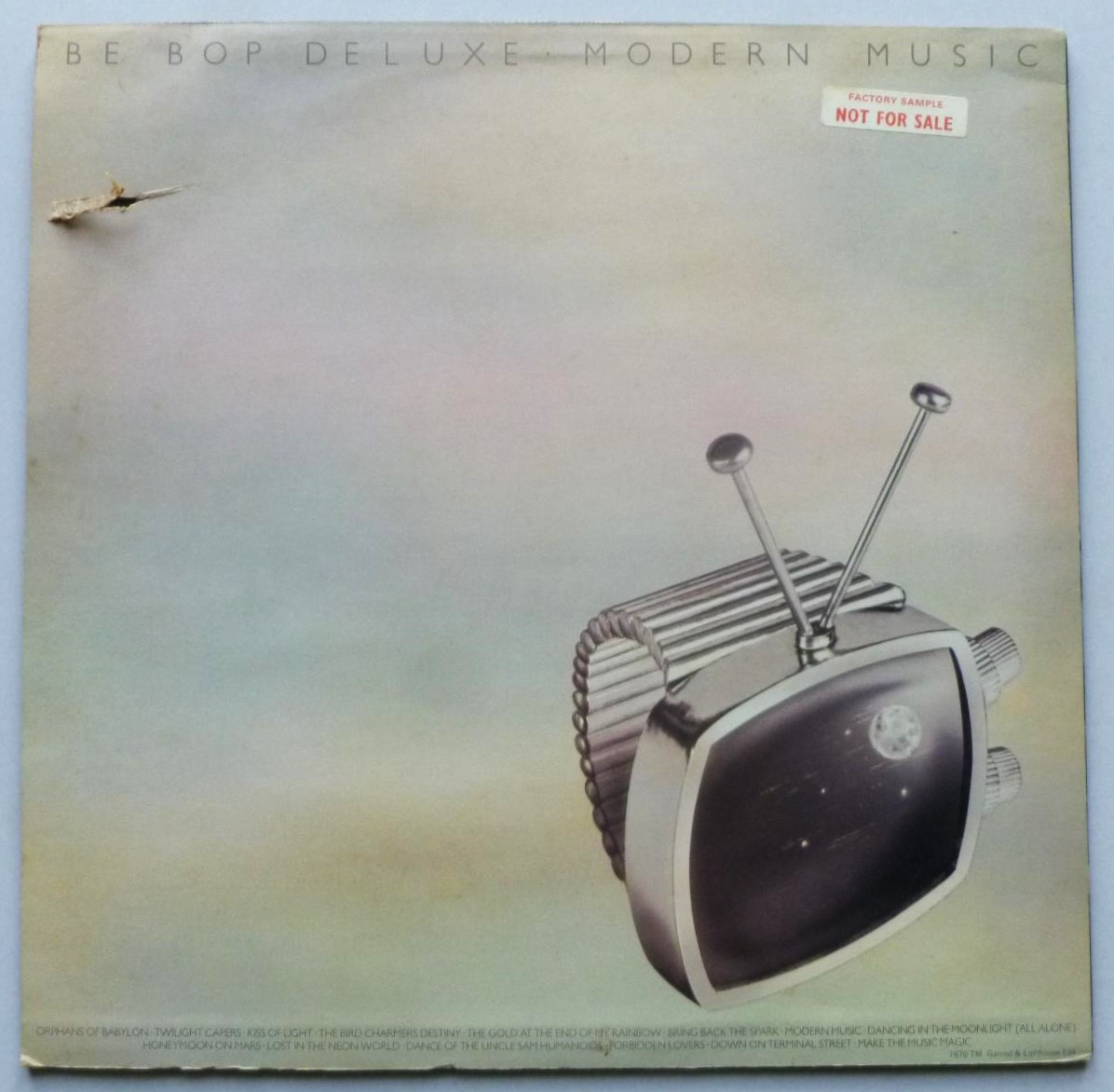 Be-Bop Deluxe Modern Music LP Harvest SHSP4058 EX/VG 1976 vinyl has some non-sounding factory marks - with inner - there is 2.5cm scrape on sleeve and inner sleeve - factory sample sticker on rear of sleeve - Image 2