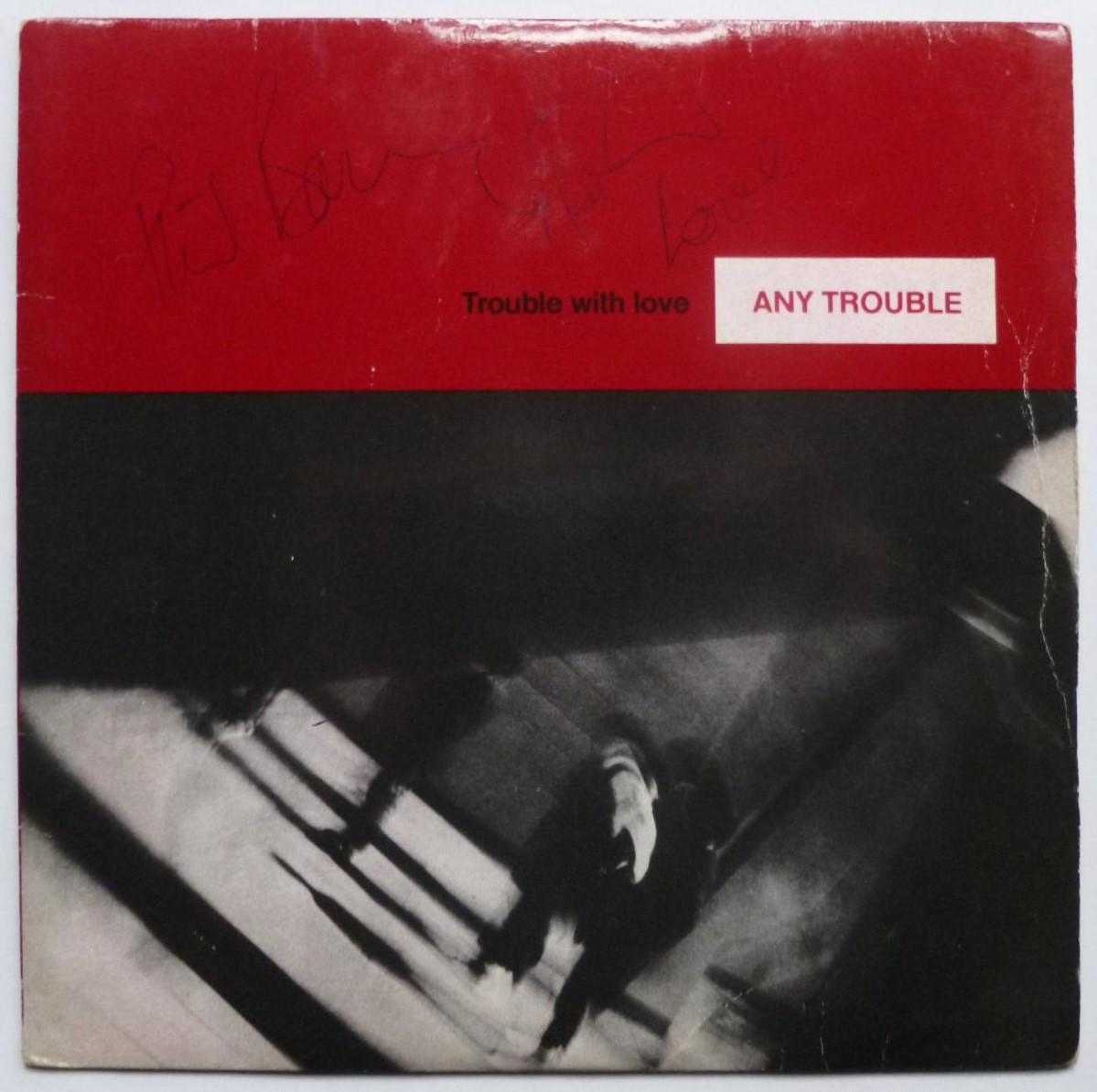 Any Trouble Trouble With Love 7" Stiff BUY119 VG/VG 1981 picture sleeve is signed on front and rear - there is sticker on side one label - Image 2