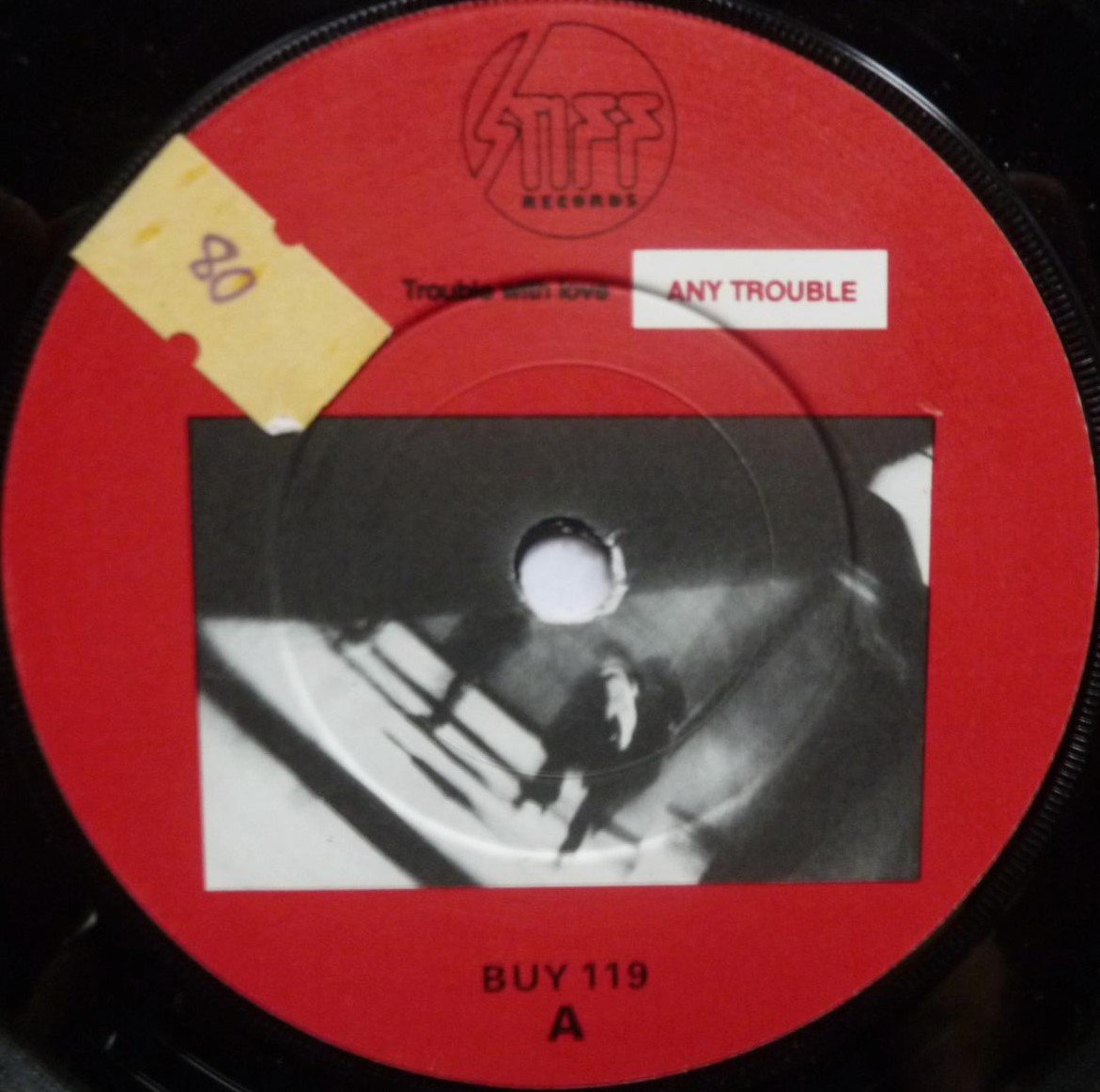 Any Trouble Trouble With Love 7" Stiff BUY119 VG/VG 1981 picture sleeve is signed on front and rear - there is sticker on side one label - Image 5