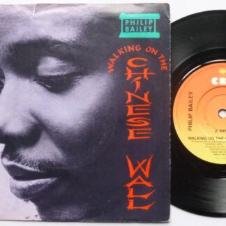 Philip Bailey Walking On The Chinese Wall 7" CBS A6202 EX/VG 1985 picture sleeve is VG because it has 1cm closed tear at the opening, the vinyl is mint